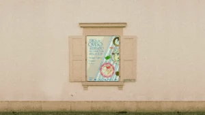 Diseño del cartel en una ventana para la Feria del Queso Artesano 2025 en Teba